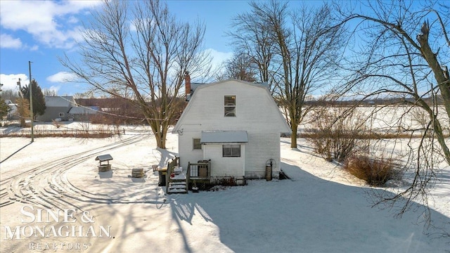 view of snow covered property