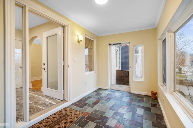 interior space with crown molding