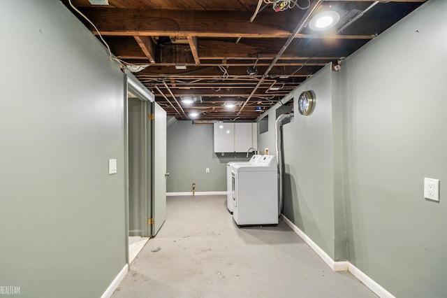 basement with separate washer and dryer