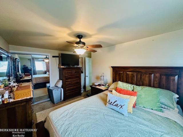 bedroom featuring a closet and ceiling fan