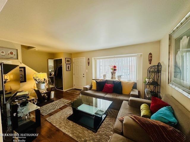 living room featuring dark hardwood / wood-style floors