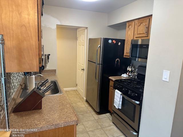 kitchen featuring sink and stainless steel appliances