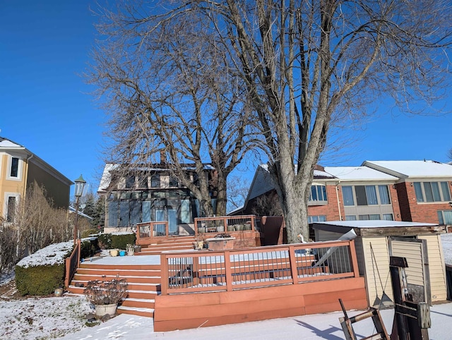 view of snow covered deck