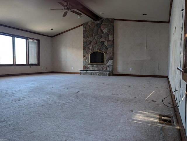 unfurnished living room featuring lofted ceiling with beams, ceiling fan, a fireplace, and light carpet