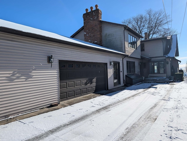 exterior space with a garage