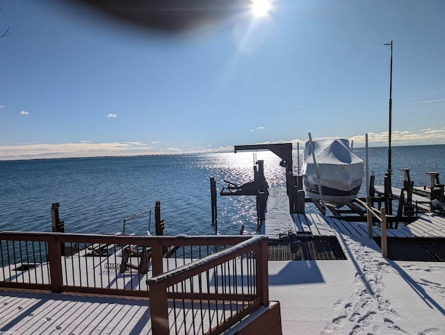 dock area with a water view