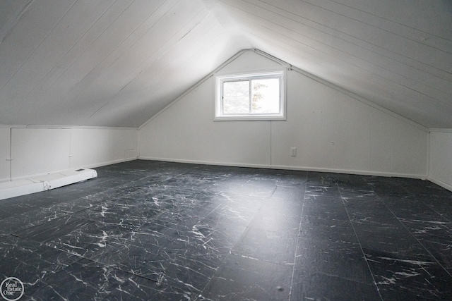 additional living space with lofted ceiling