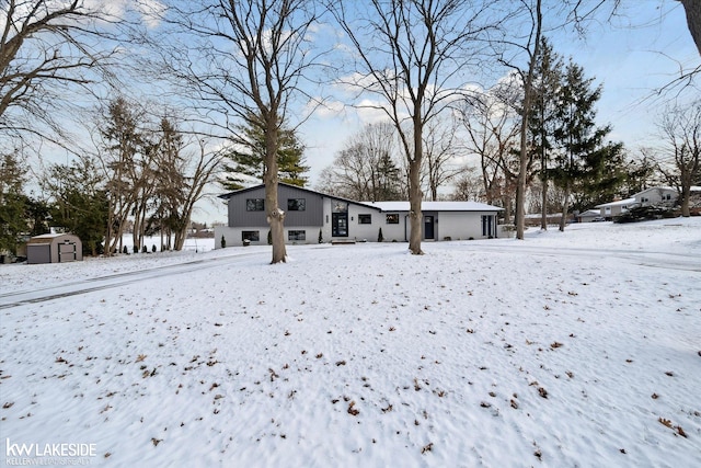 exterior space with a storage shed