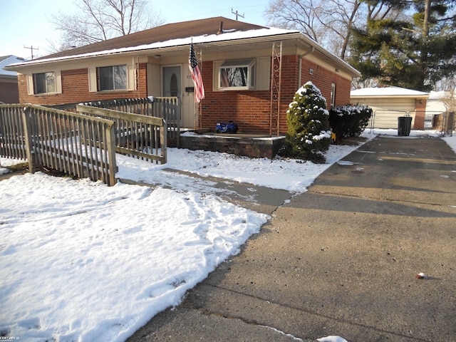 view of front of house with an outbuilding and a garage