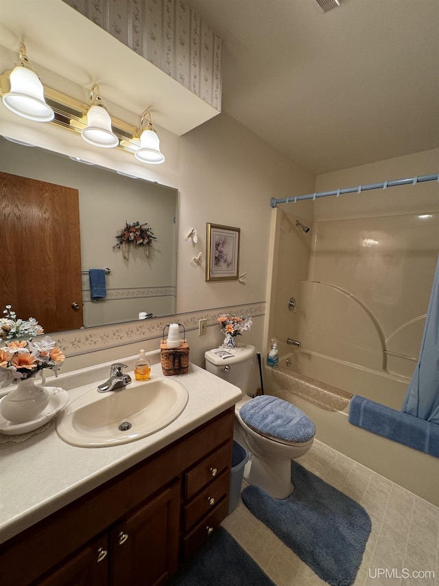 full bathroom with shower / bathing tub combination, vanity, and toilet