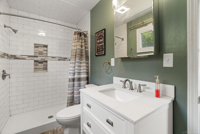 bathroom with a shower with curtain, vanity, and toilet