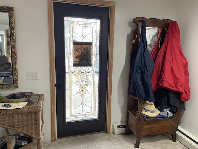 carpeted foyer with baseboard heating