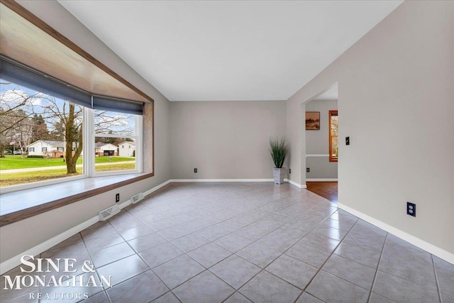 view of tiled empty room