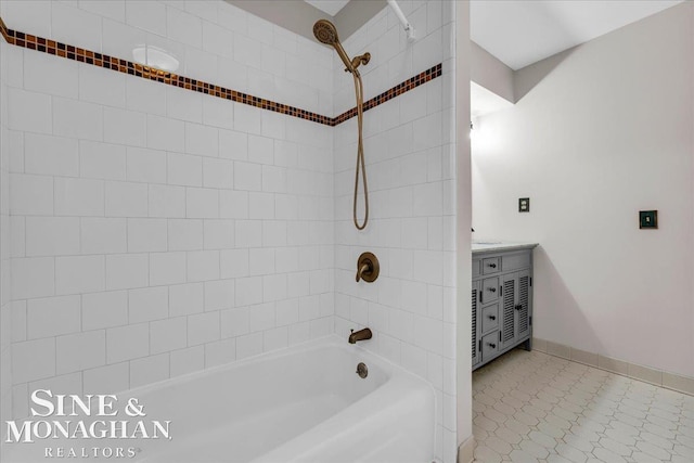 bathroom featuring vanity and bathing tub / shower combination