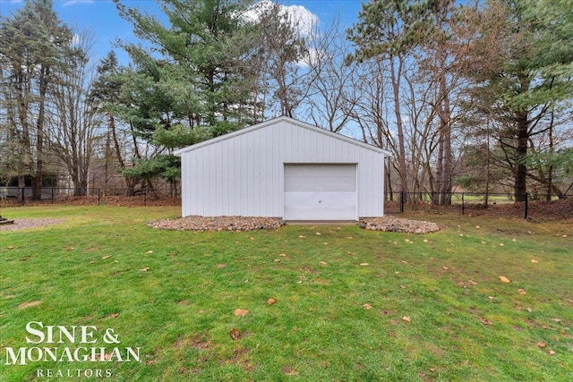 garage with a lawn