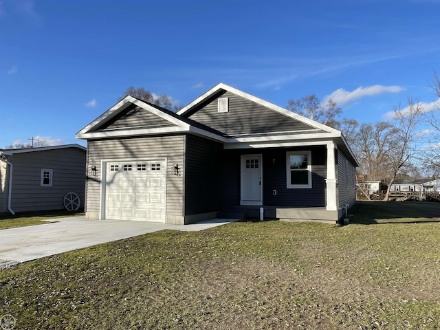 view of front facade featuring a garage and a front lawn