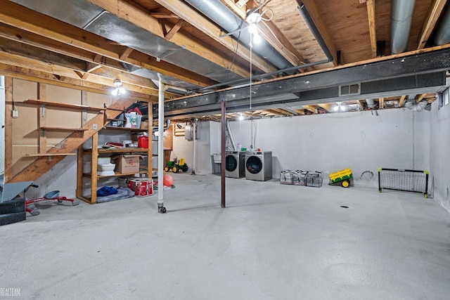 basement featuring separate washer and dryer