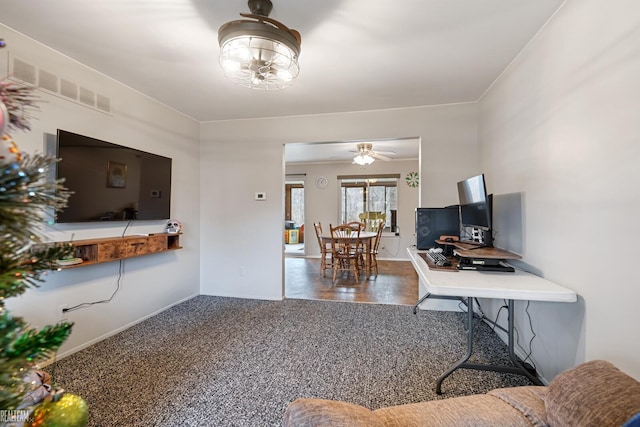 living room featuring ceiling fan