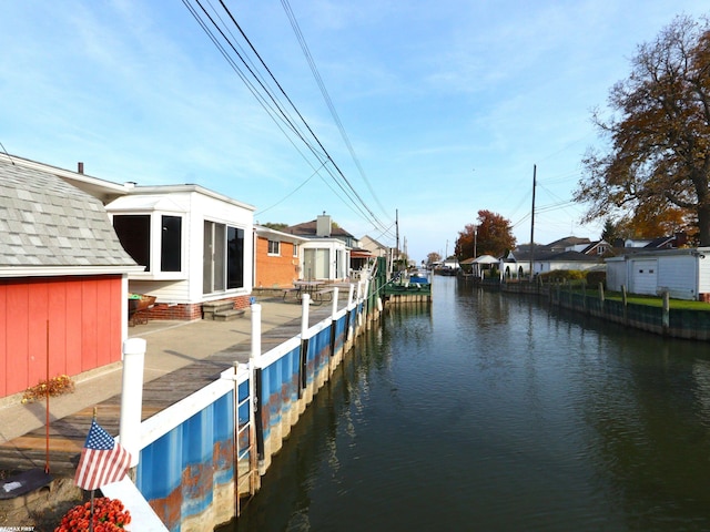 dock area with a water view