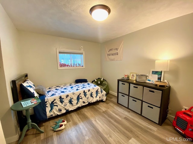 bedroom featuring light hardwood / wood-style flooring