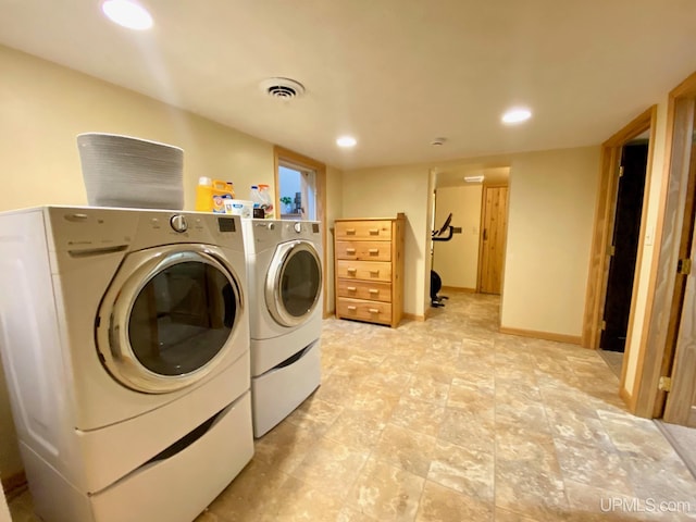 washroom featuring separate washer and dryer