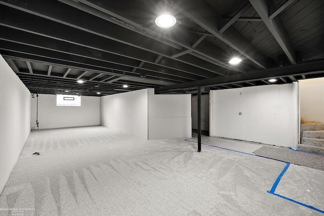 basement with carpet flooring