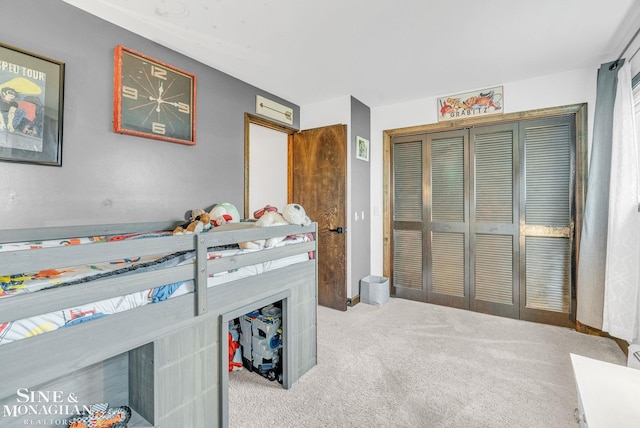 carpeted bedroom featuring a closet