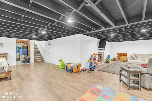 game room featuring hardwood / wood-style flooring