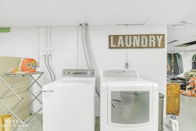 washroom with independent washer and dryer