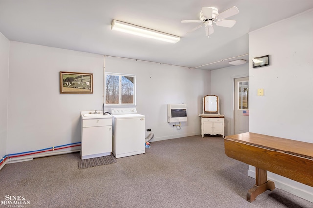 washroom with sink, ceiling fan, washer / dryer, carpet floors, and heating unit