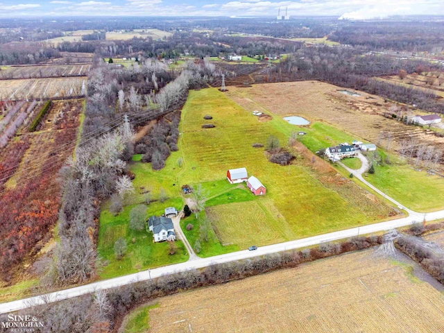 birds eye view of property featuring a rural view