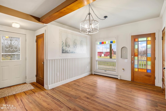 foyer entrance featuring wood-type flooring, an inviting chandelier, a baseboard heating unit, and beam ceiling