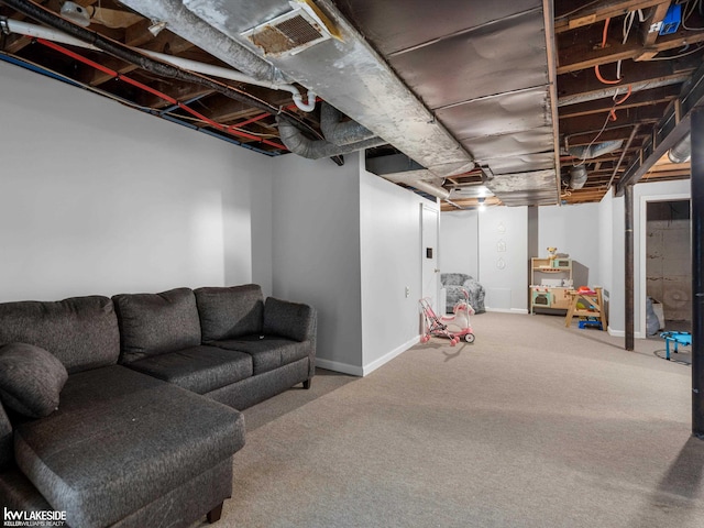 basement with carpet flooring