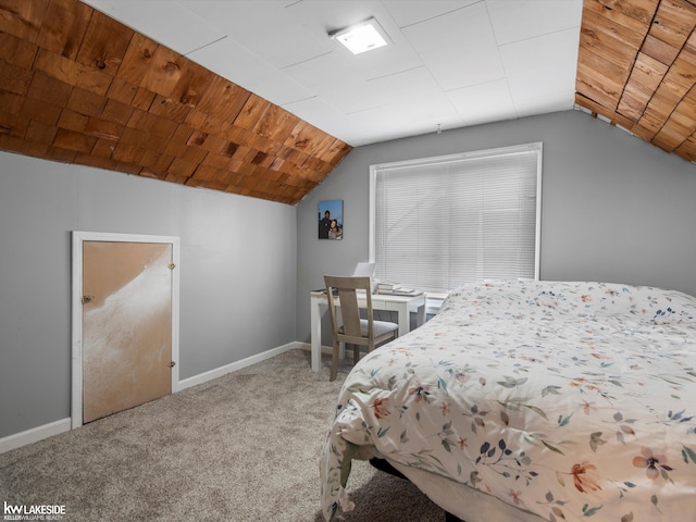 bedroom featuring carpet flooring and vaulted ceiling