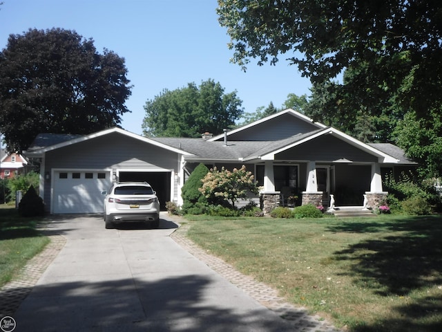 craftsman-style house with a front yard and a garage