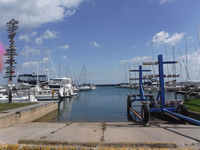 view of dock with a water view