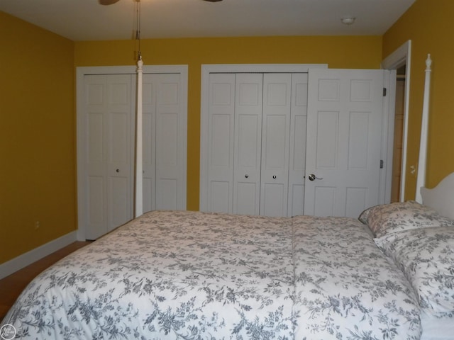 bedroom featuring multiple closets