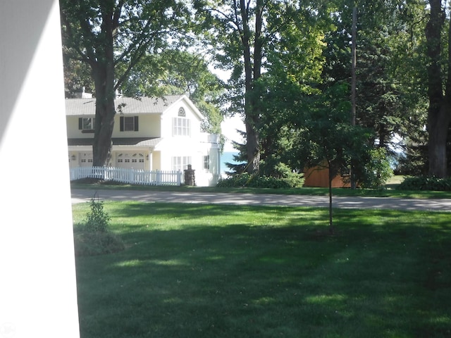 view of yard featuring a garage