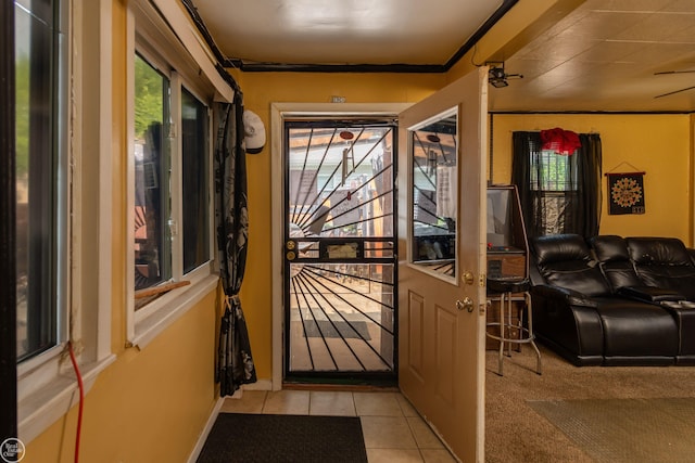 doorway featuring light tile patterned flooring