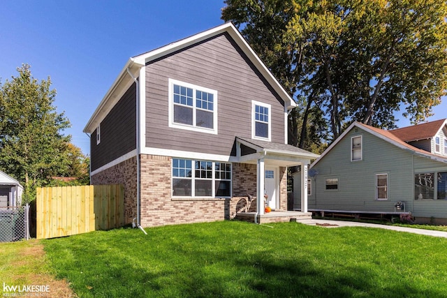 front of property featuring a front lawn