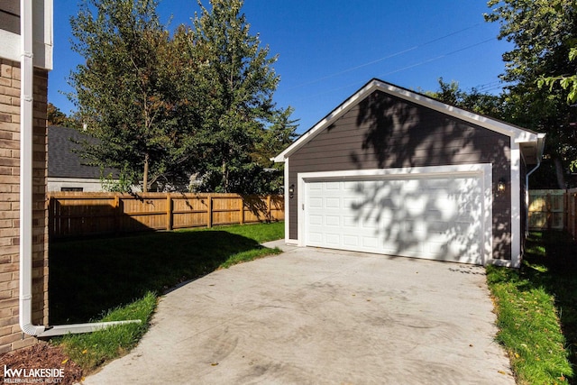 garage with a lawn