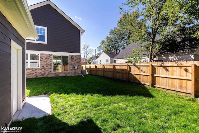 view of yard featuring central AC unit