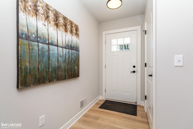 doorway featuring light wood-type flooring