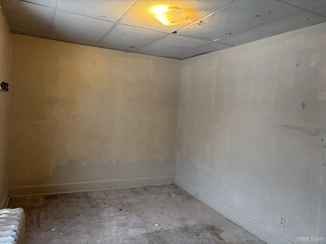 empty room with a drop ceiling