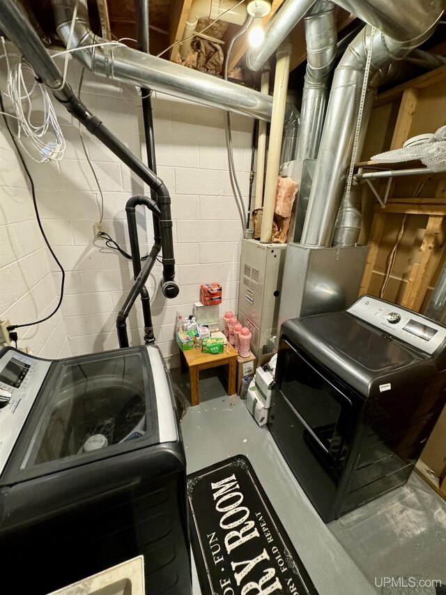 interior space with washer and clothes dryer