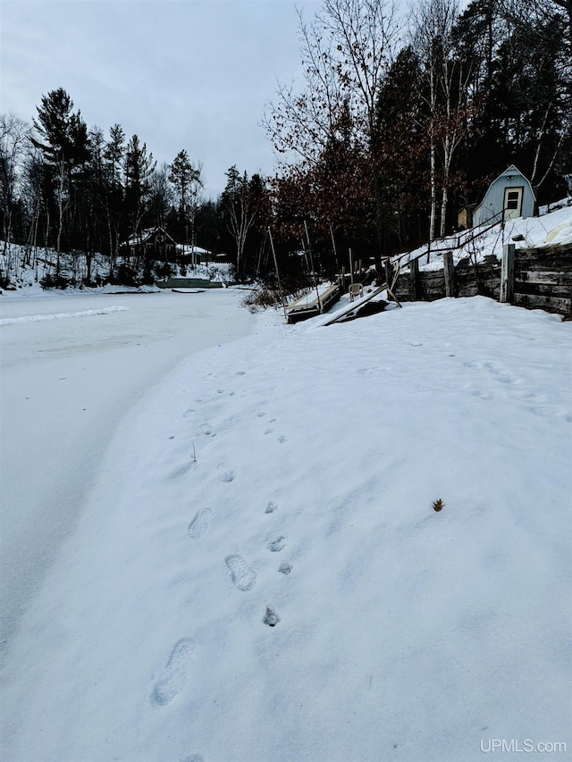 view of yard covered in snow