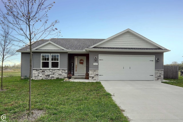 ranch-style home featuring a garage and a front lawn