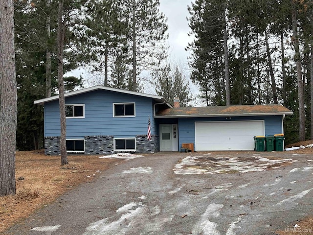 tri-level home featuring a garage