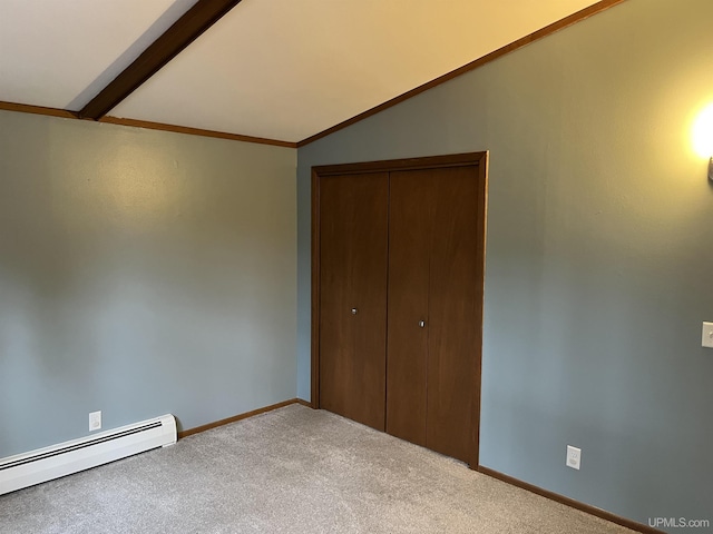 unfurnished bedroom with carpet, lofted ceiling with beams, a closet, and baseboard heating