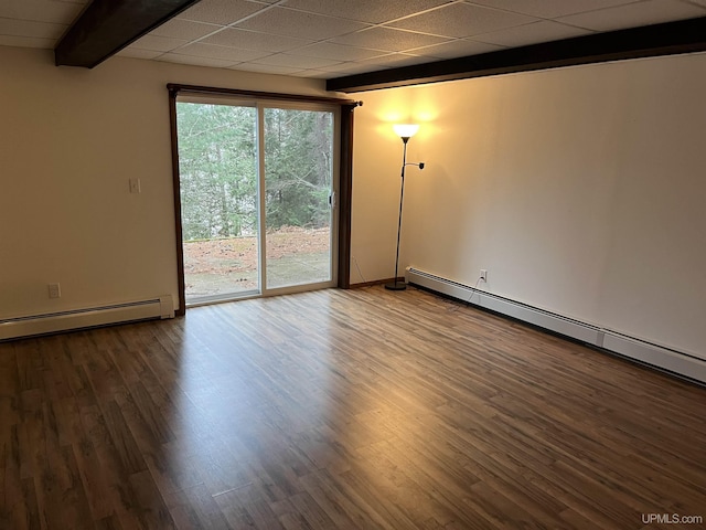 unfurnished room with a drop ceiling, beam ceiling, dark wood-type flooring, and a baseboard heating unit